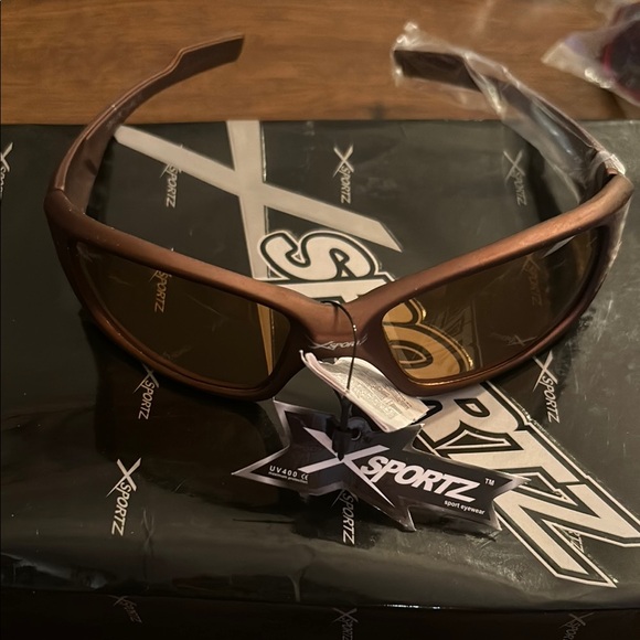 Xsportz Other - New in package XSportz brown uv400 sunglasses 😎 OS